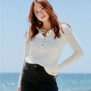 NEW Henley style waffle fabric top. Sweet ruffle with decorative buttons.